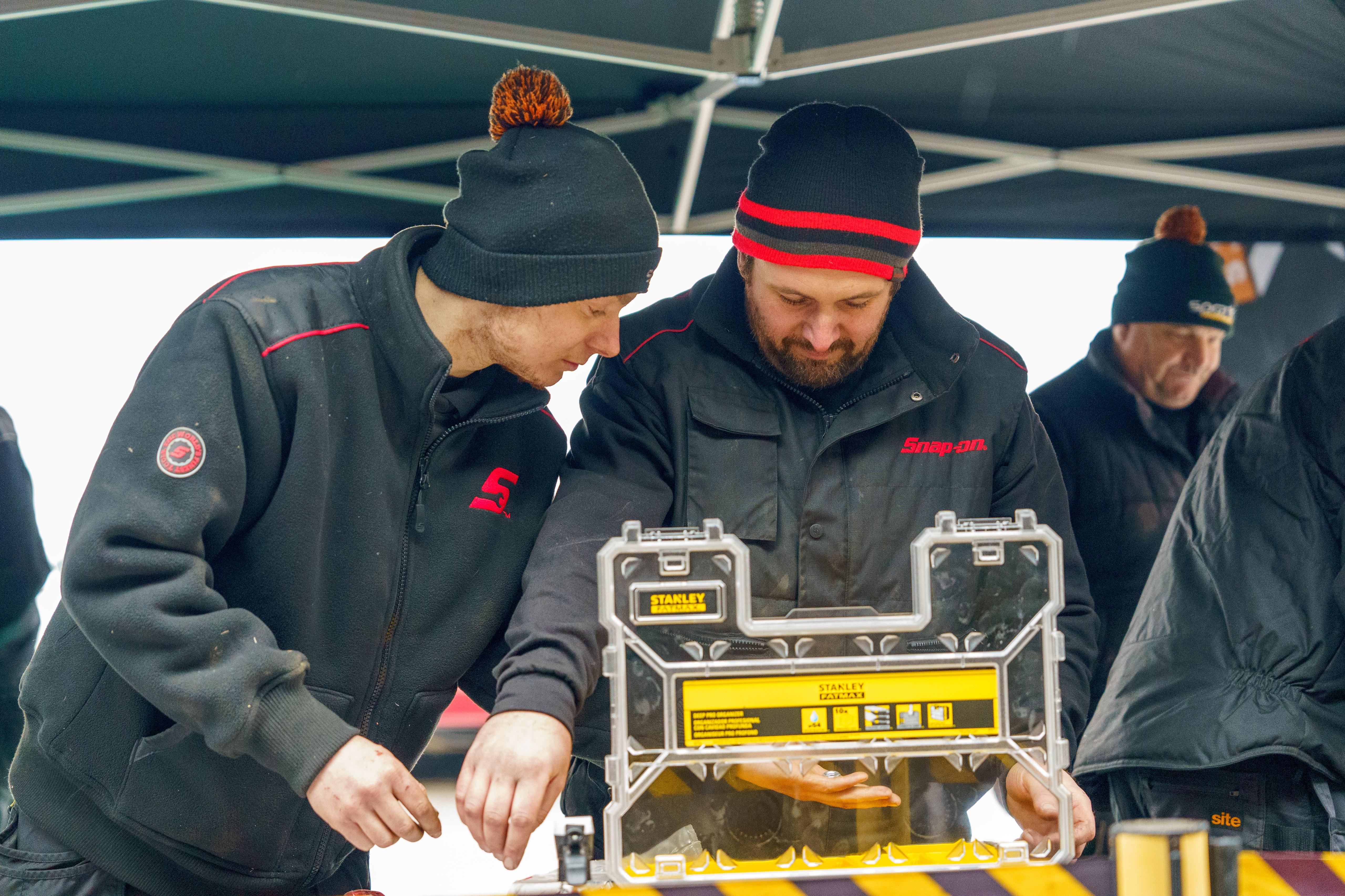 Team members working on the build